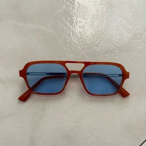 Orange Sunglasses with Blue Lenses